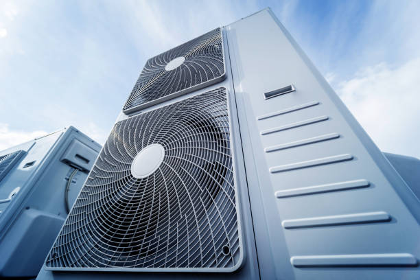 air conditioners on the roof of an industrial building. hvac - air duct imagens e fotografias de stock