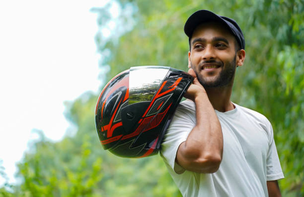 istock Asian man with bike helmet 1330542064
