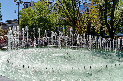 Sofia, Bulgaria - September 22, 2012: Water fountain in the garden in front of the Ivan Vazov National Theater building in Sofia, Bulgaria. Visit in place.