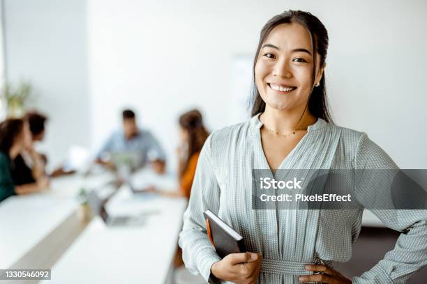 Doing Business With A Smile Stock Photo - Download Image Now - Employee, Smiling, Happiness