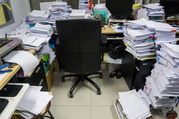 istock Busy, messy and cluttered workplace, full of documents 1330553141