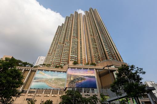 Hong Kong - July 25, 2021 : The Victoria Towers residential buildings in Canton Road, Tsim Sha Tsui, Kowloon, Hong Kong. The complex consists of three towers, each rising 62 floors and 213 metres (699 ft) in height.