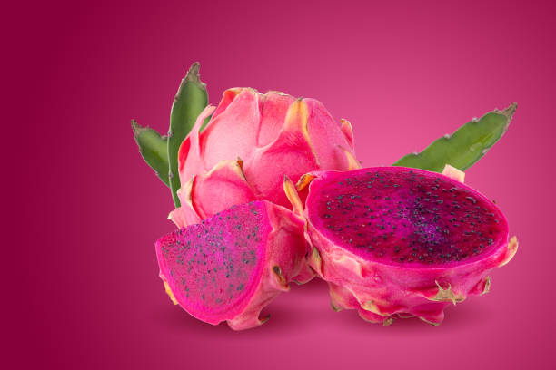 istock Ripe pitahaya fruit or dragon fruit with half isolated on red background 1330564377