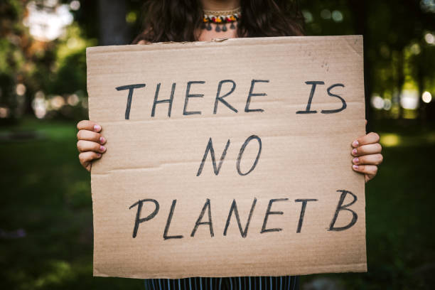 istock Young activist / protester. Environmental conservation / Climate change protest. 1330568506