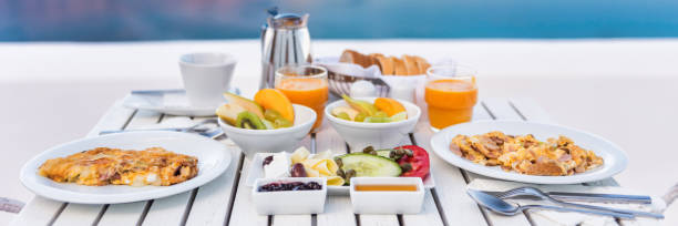 istock Breakfast brunch table fruits and omelets 1330569440