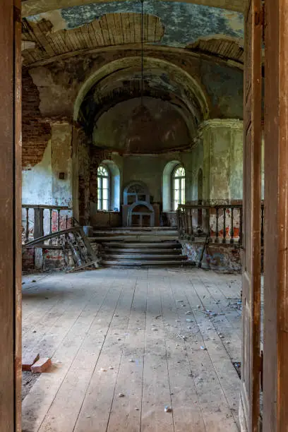 Photo of abandoned church in Latvia, Galgauska, view through the entrance door to the interior