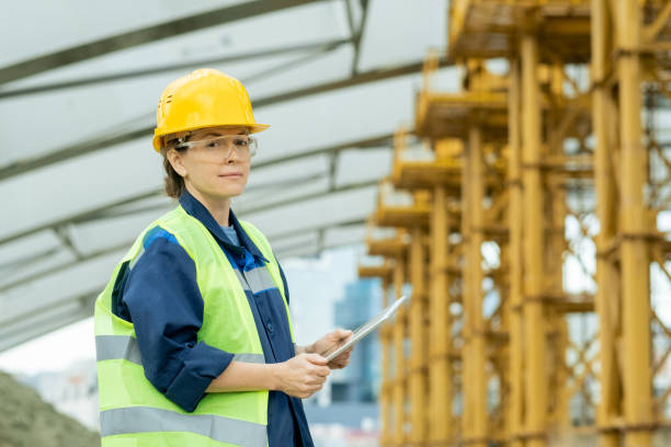 istock Woman working on construction site outdoors 1330576022