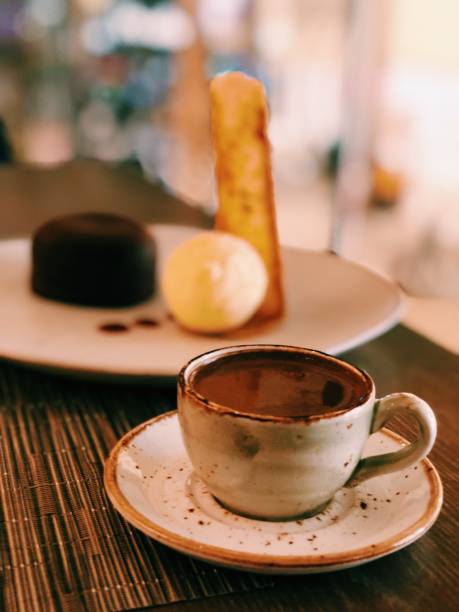 istock Black coffee and sweet 1330576452