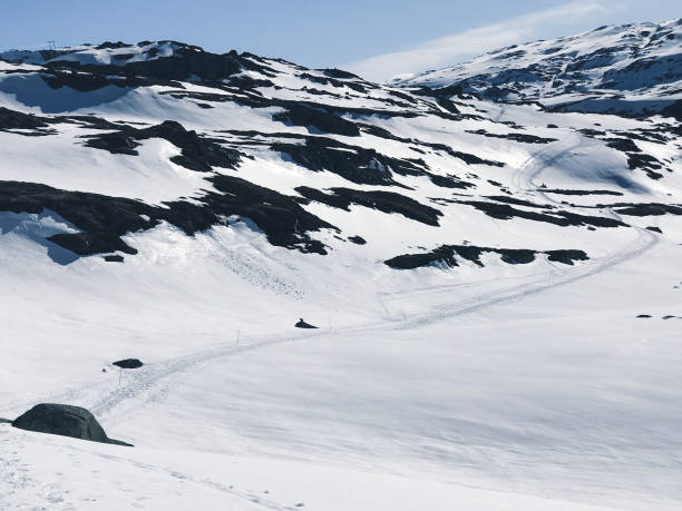 istock Odda, Norway: endless hiking path through snow to Trolltunga 1330585892