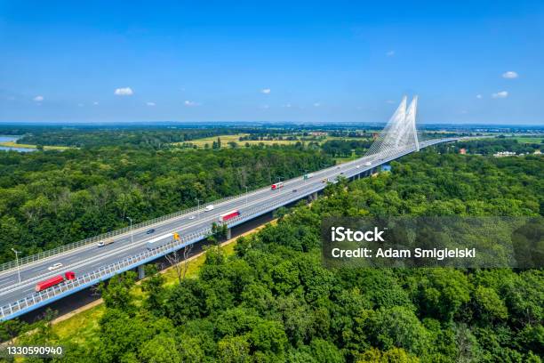 Highway With The Suspension Bridge Stock Photo - Download Image Now - Poland, Highway, Truck