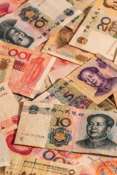 istock Chinese Renminbi RMB. Yuan CNY banknotes 1330593240