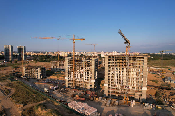 istock Cnstruction site with tower cranes during conctruct the high-rise building 1330594355