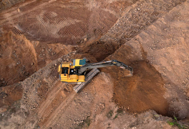istock Excavator dig ground at construction site. Foundation pit for a multi-story building. 1330594369