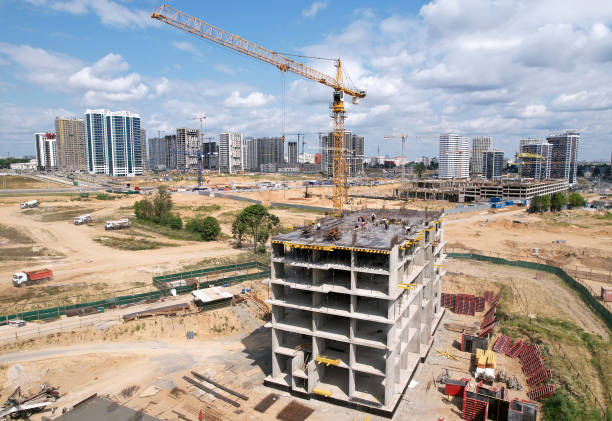istock Construction site with tower cranes during conctruct the high-rise building 1330595376