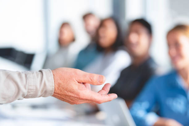 istock Group of people listening to a presentation. 1330603236