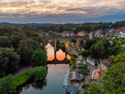Knaresborough railway viaduct over the river Nidd in North Yorkshire, England taken on a summer evening at sunset