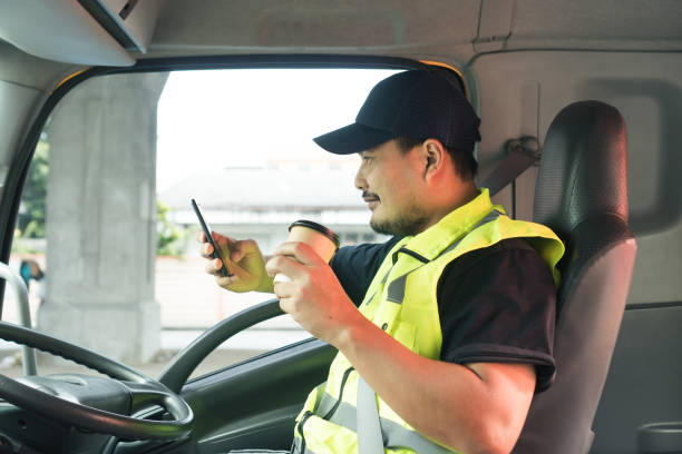 istock happy smiling men truck driver holding cup coffee drink 1330612336