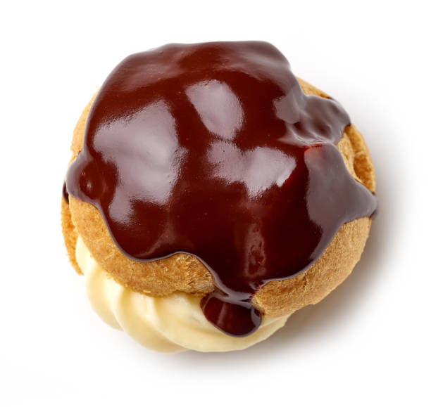 istock cream puff with custard cream covered with melted chocolate 1330613120