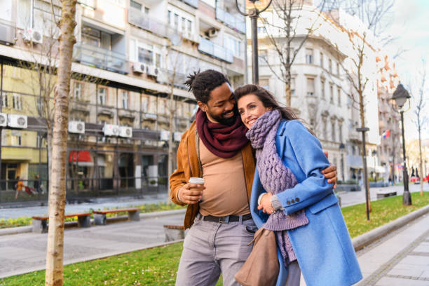 istock A Multi-Ethnic Couple is Sharing Lovely Emotions in the Park. 1330613397