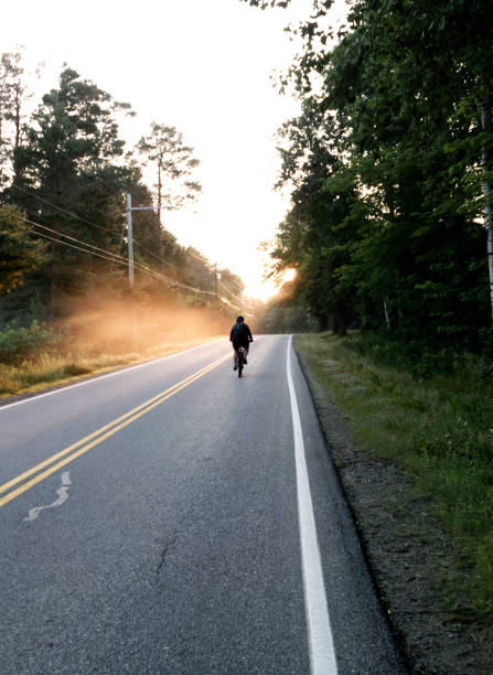 istock A bike on a road at sunrise 1330614055