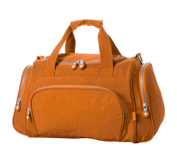 istock Textile travel bag in orange color on a white background 1330615674