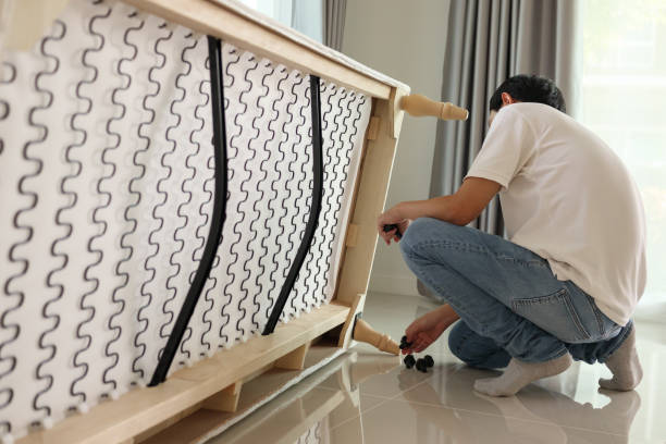 istock Man assembling sofa furniture at home 1330616091