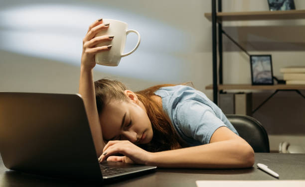 istock workaholic remote job tired sleeping woman office 1330616505