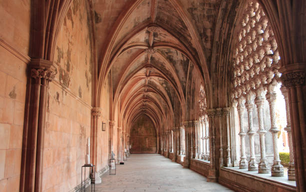 istock Stone arches at the Gothic Cloister inside the Batalha Monastery 1330617638