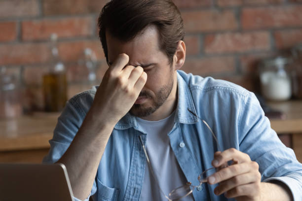 istock Sad business man, remote employee tired of work at computer 1330623015