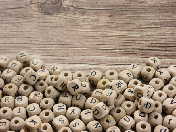 istock alphabets on wood cube for education or communications  concept 1330624326