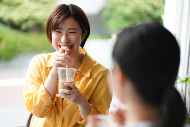 istock A woman talking over a drink 1330630565