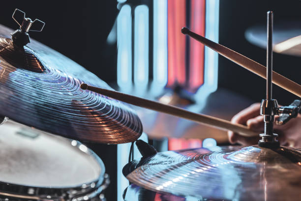 istock Close up the drummer plays drums with drum sticks. 1330643402