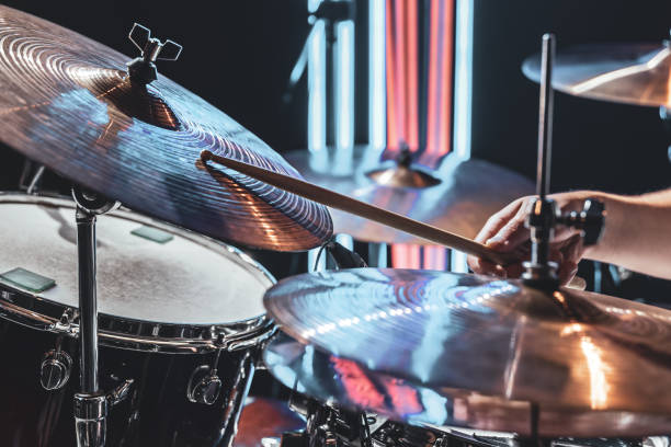 istock Close up the drummer plays drums with drum sticks. 1330643404