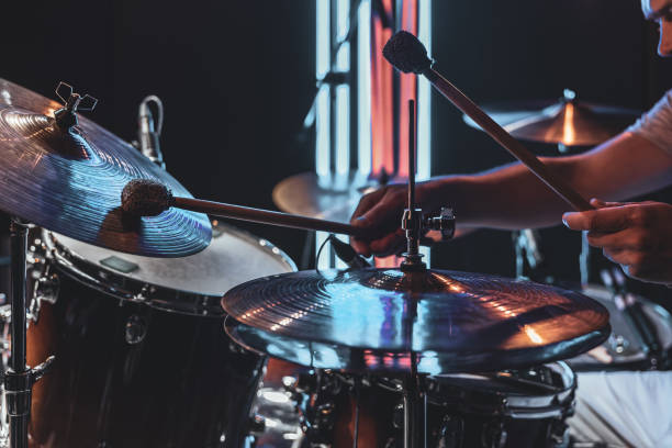 istock A male drummer plays drums with special drum sticks. 1330643406