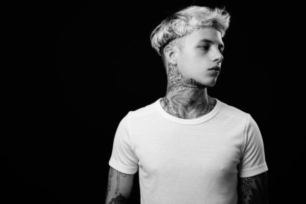 Portrait of a sexy man in a shirt and trousers black and white photography. High quality photo