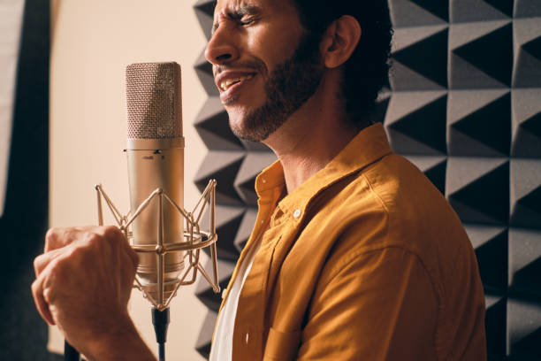 istock Man singing in the music studio 1330649185