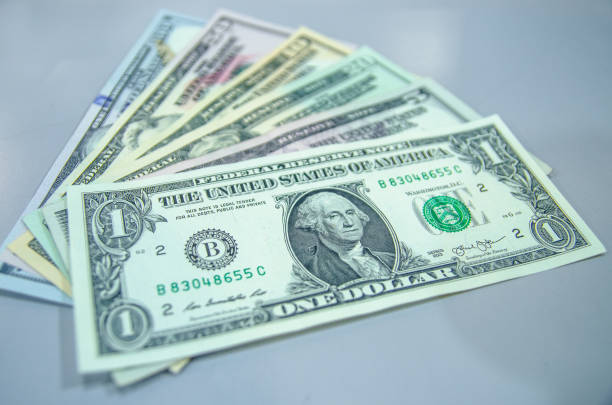 American Money dollar bills, Us dollar currency ( USD ). stock photo
