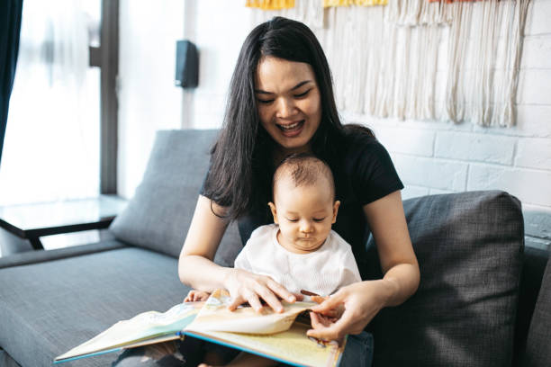 istock mother  reading to her baby 1330653111