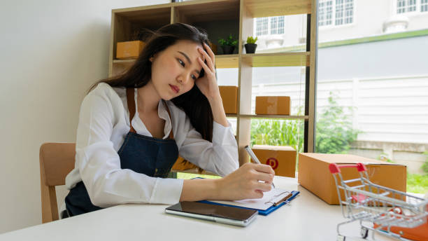 istock start a business sme beautiful asian girl working with boxes and laptops taking orders from customers at home online selling and delivery ideas 1330656071
