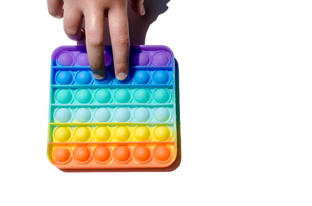 istock Girl playing with Pop it Fidget Toy 1330657609