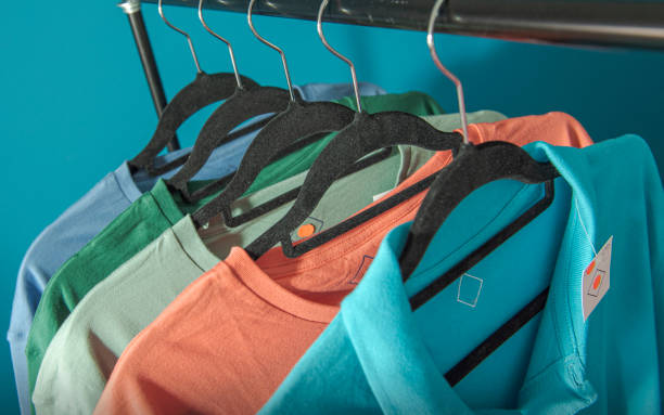istock Forgotten clothes in the warehouse are covered with dust 1330661117