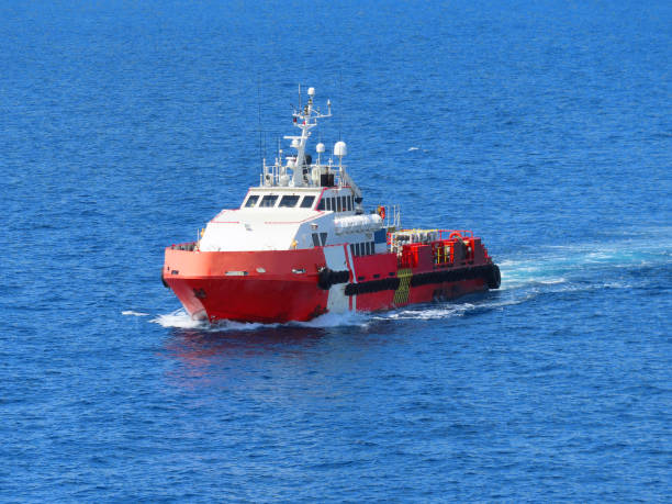 istock Boat is waiting transfer cargo and crews to platform. 1330662477