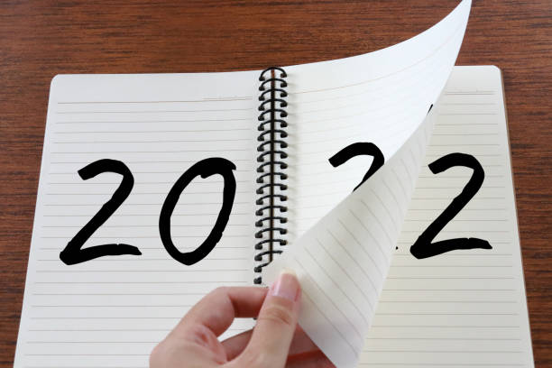 istock Turn the page from 2021 to 2022. 1330664564