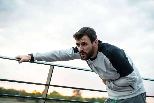 istock Young Man Suffered Stomach Injury During Morning Exercise 1330664853