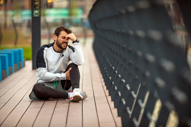 istock Young Man Suffered a Knee Injury During Morning Exercise 1330665193