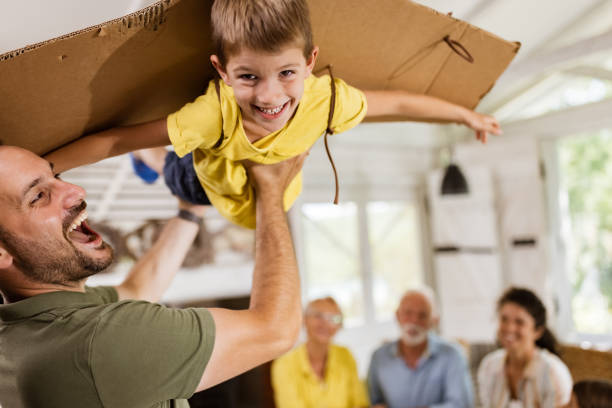istock Weee daddy, I'm flying like an airplane! 1330667561