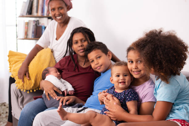 istock Happy same-sex family with five children. 1330675431
