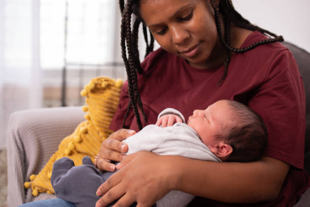 istock Mother holding her child. 1330676117