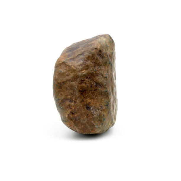 istock Big granite rock stone, isolated on the white background. 1330676885