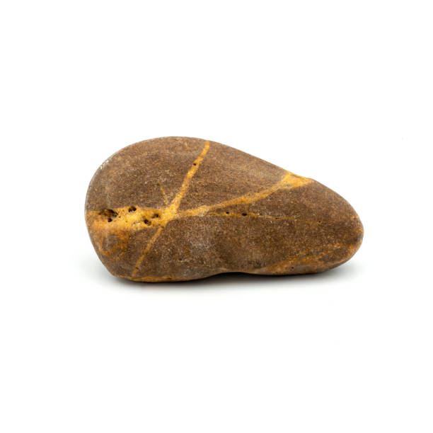 istock Big granite rock stone, isolated on the white background. 1330676892